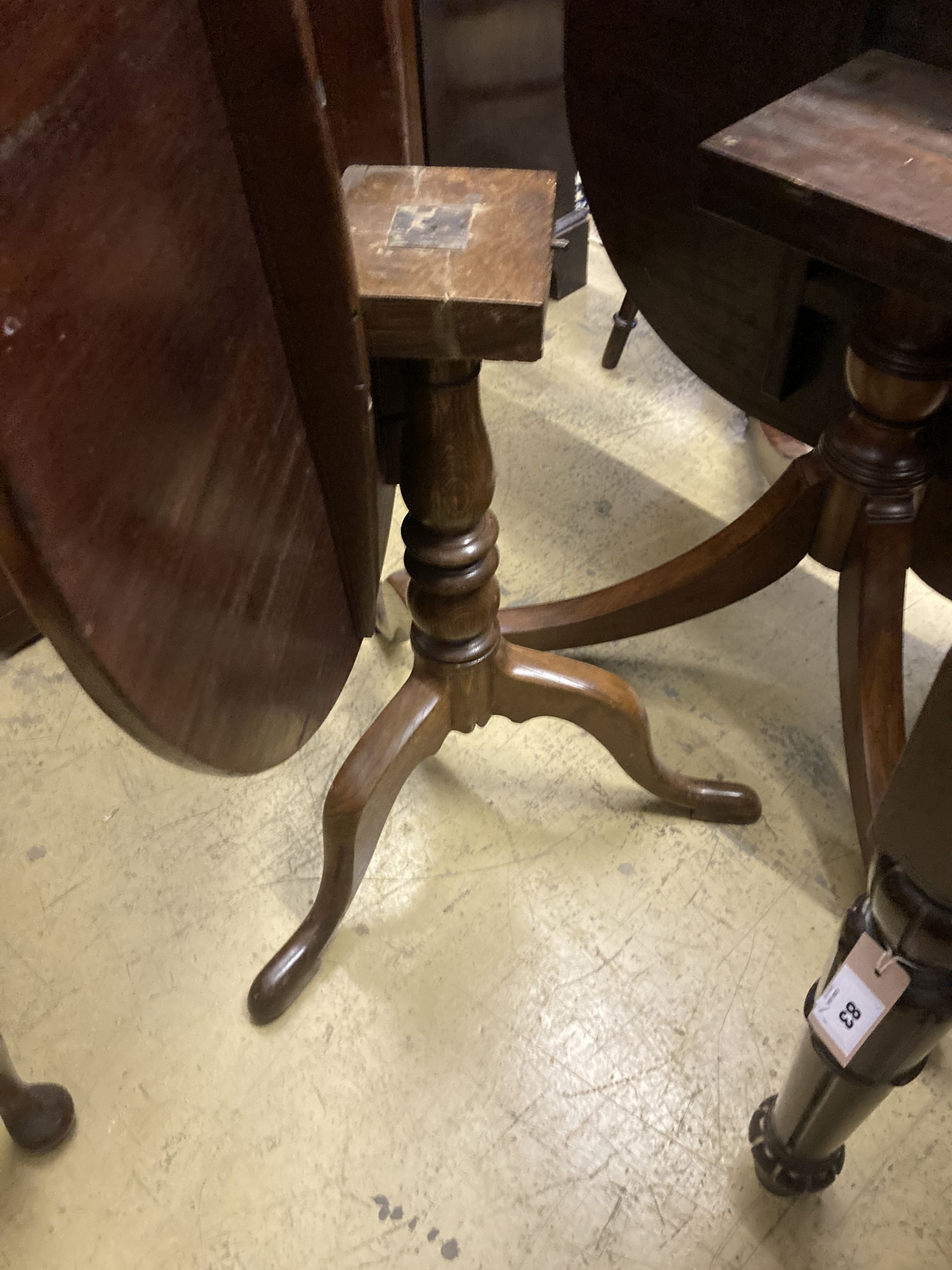 A George III oak and mahogany tilt top tea table, 81cm diameter, height 73cm